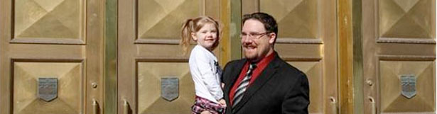 Jason Nixon with his daughter Chyanne, 4 outside of Calgary Courts Centre in Calgary, Alberta on April 27, 2011was exonerated after the crown withdrew charges that Nixon shot a horse near Sundre, Alberta. Photograph by: Leah Hennel, Calgary Herald